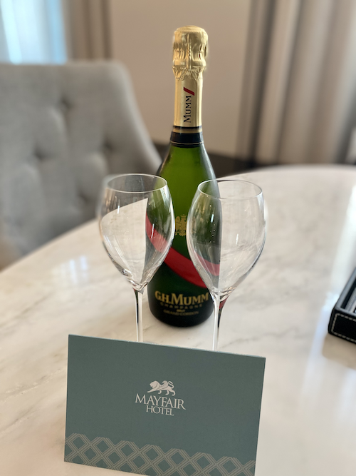 Champagne on bed at Mayfair Hotel Adelaide